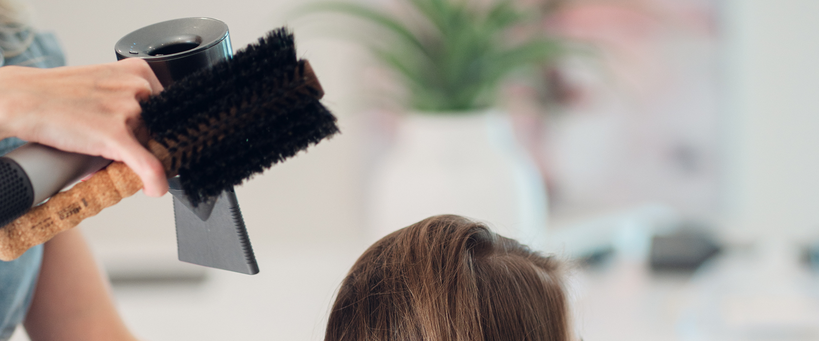 Shine Blow Dry Bar image of woman getting hair styled